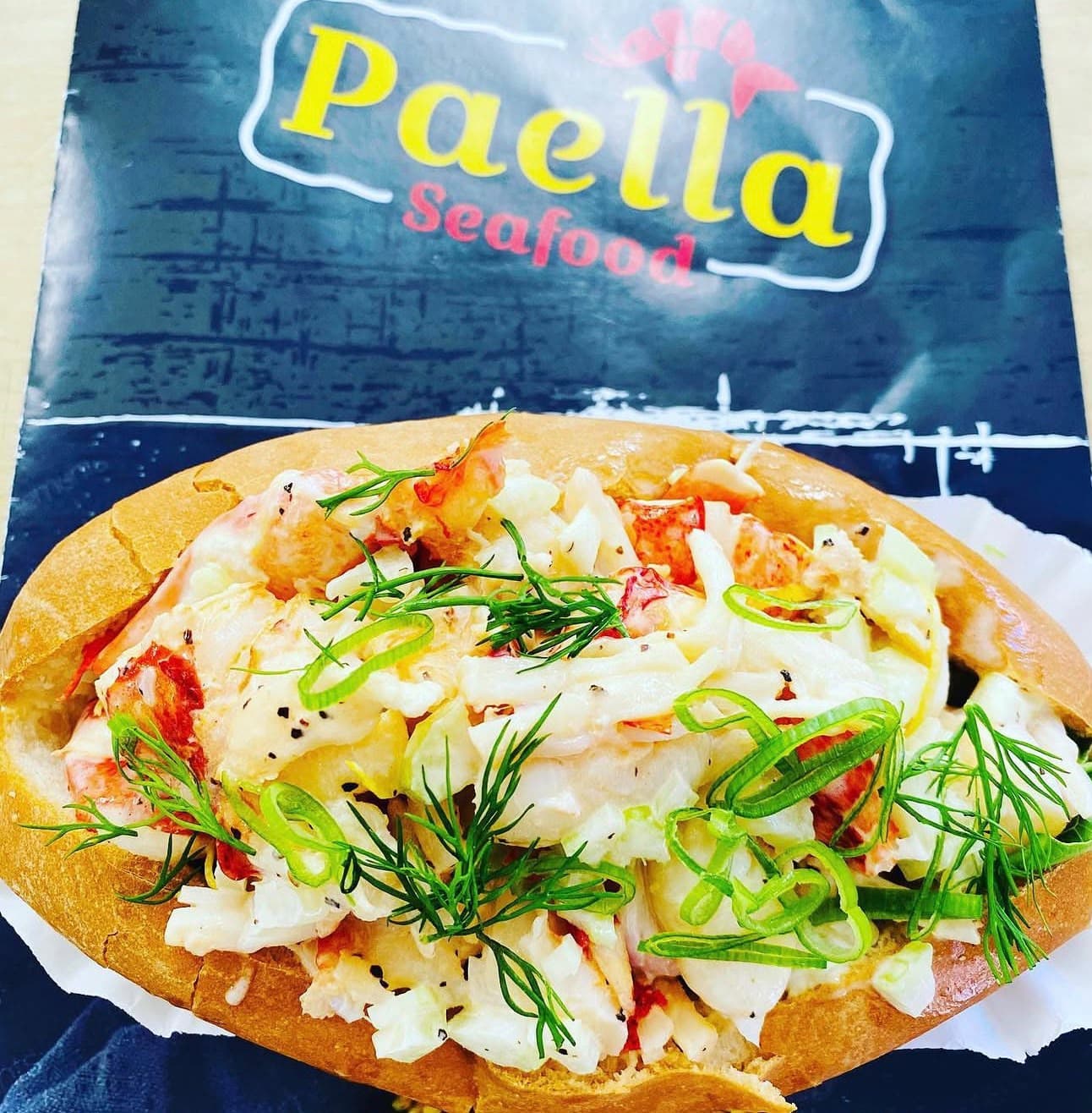 Lobster roll with dill and scallion